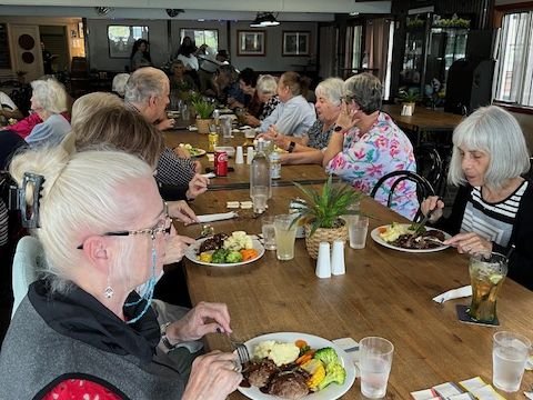 Members and guests enjoying lunch at the Peak Crossing Hotel during our mystery day bus trip in March 2024